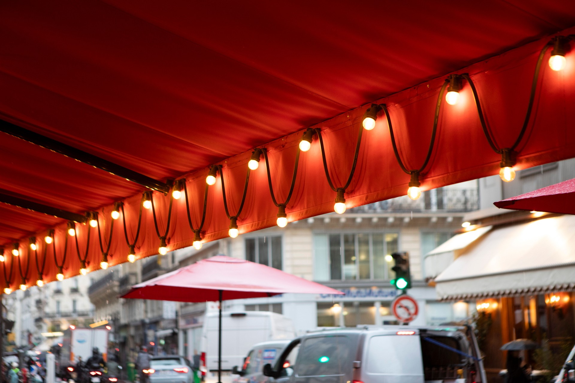 String lights under a cafe canopy